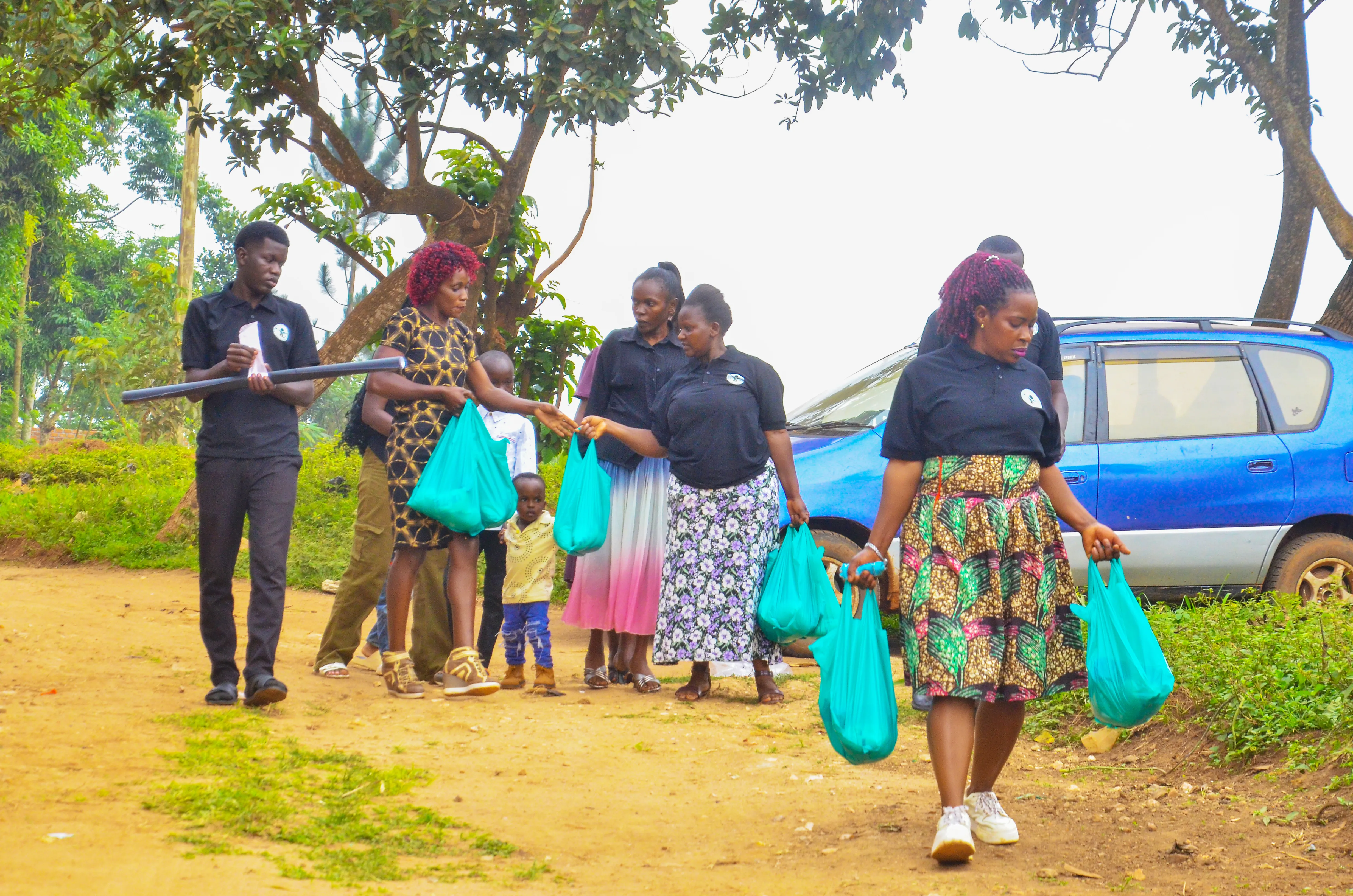 Group of volunteers arriving with supplies